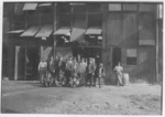 Lewis Hine child labor: A group of workers in Jonas Glass Works, Minotola, N.J. These are typical of conditions in Southern N.J. although one finds, occasionally, a few younger workers. Location: Minotola, New Jersey.
