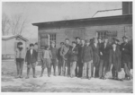 Lewis Hine child labor: Noon hour. Moore Bros. Glass Co., Clayton, N.J. All are workers. Location: Clayton, New Jersey.