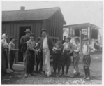 Lewis Hine child labor: Noon hour at Obear-Nestor Glass Co., East St. Louis, Ill. Names of the smaller boys are: Walter Sohler [i.e. Kohler?] , 918 N. 18th. St.; Walter Riley, 918 N. 17th St.; Will Convery, 1828 Natalie Ave.; Clifford Matheny, 1927 Summit Ave. All these boys were working at above glass works. See 1405. Location: St. Louis, Missouri.