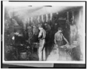 Lewis Hine child labor: Glass works, night scene. Location: Indiana.