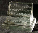 A. J. Lely & Son pavement light/paperweight
